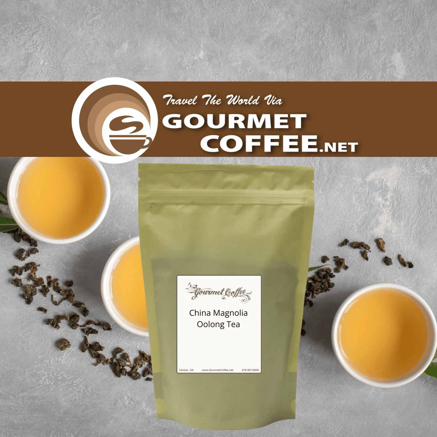 A stand-up pouch of Gourmet Coffee.net China Magnolia Oolong Tea centered on a gray textured background, with two white cups of brewed tea and scattered tea leaves around it.